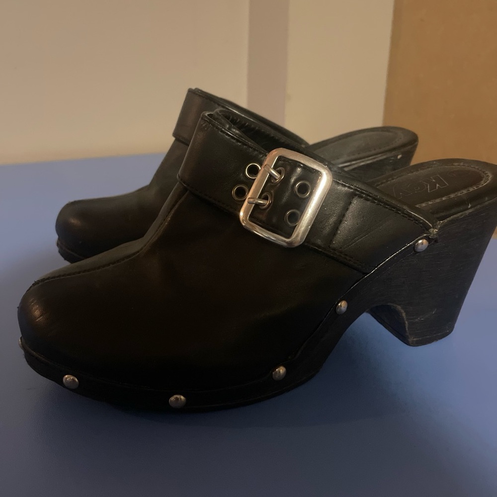 2 pairs of clogs , heeled , slip on with studded detailing